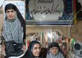 مادر شهید محمد قدر آبادی  پوتین های یادگاری شهیدش را به موزه شهدا تحویل داد